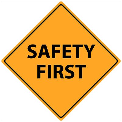 Orange "Safety First" sign