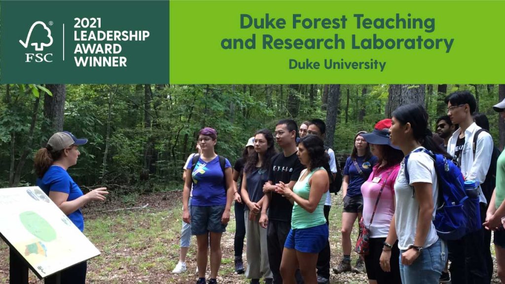 Image of DF staff leading a tour to students in Forest with FSC logo and text about Duke winning the 2021 Award